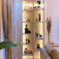 Styled display shelf with decor pieces