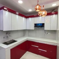Modern red and white fitted kitchen