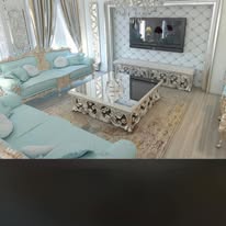 Opulent living room styled in teal with a mirrored feature wall