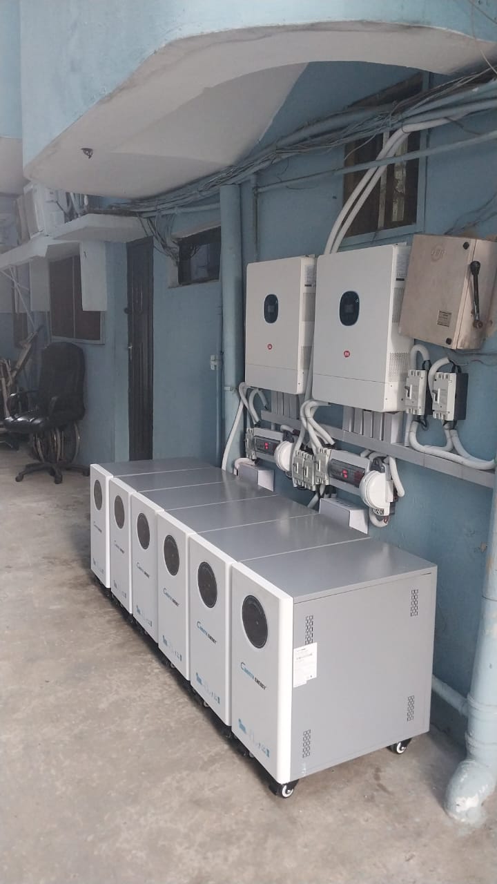 Battery and inverter units installed in a plant room